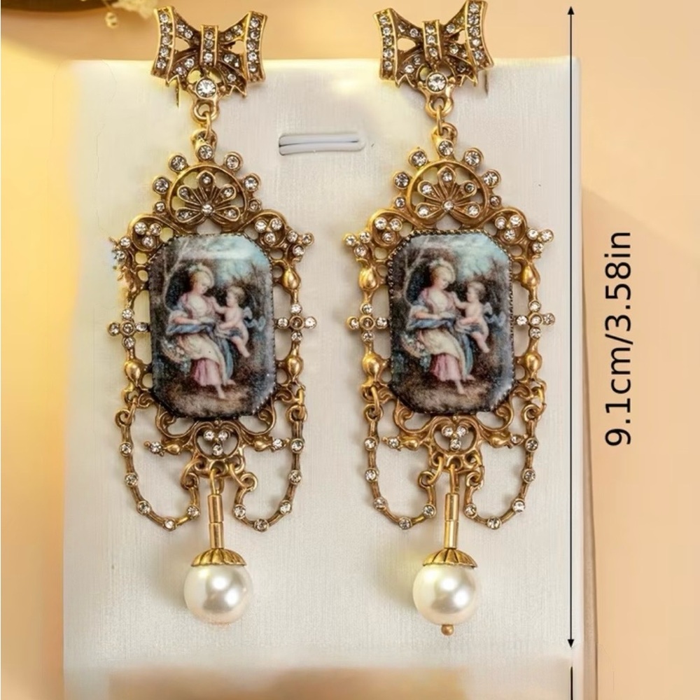 Elegant Antique portrait earrings with Gold and Pearl Drop accents